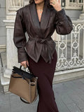 Chaqueta con cinturón para mujer